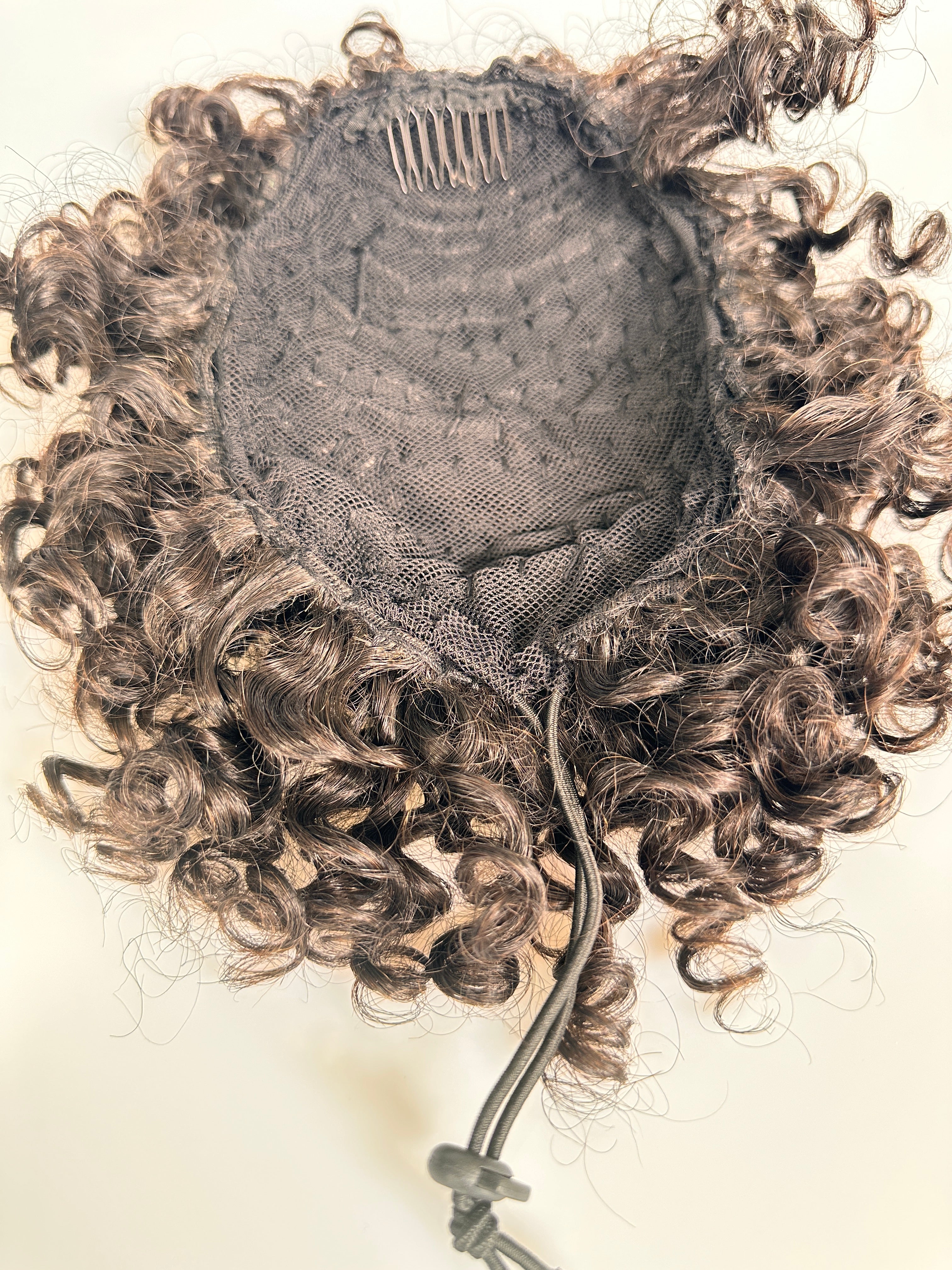 kinky curly 6” (Afro)drawstring ponytail.